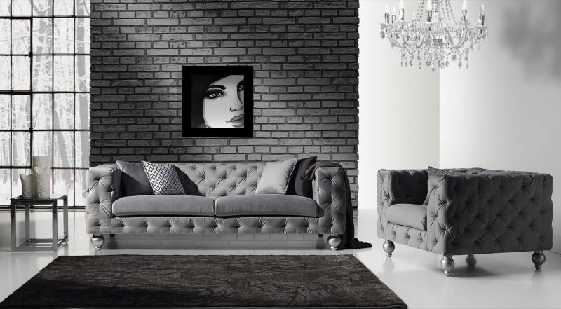 Sofa Chester to klasyka wśród sof,  pikowany korpus sofy połączony z zaoblonym siedziskiem wypełnionym  bardzo komfortową pianką,  wsparty na  drewnianych nóżkach w kształcie kuli.